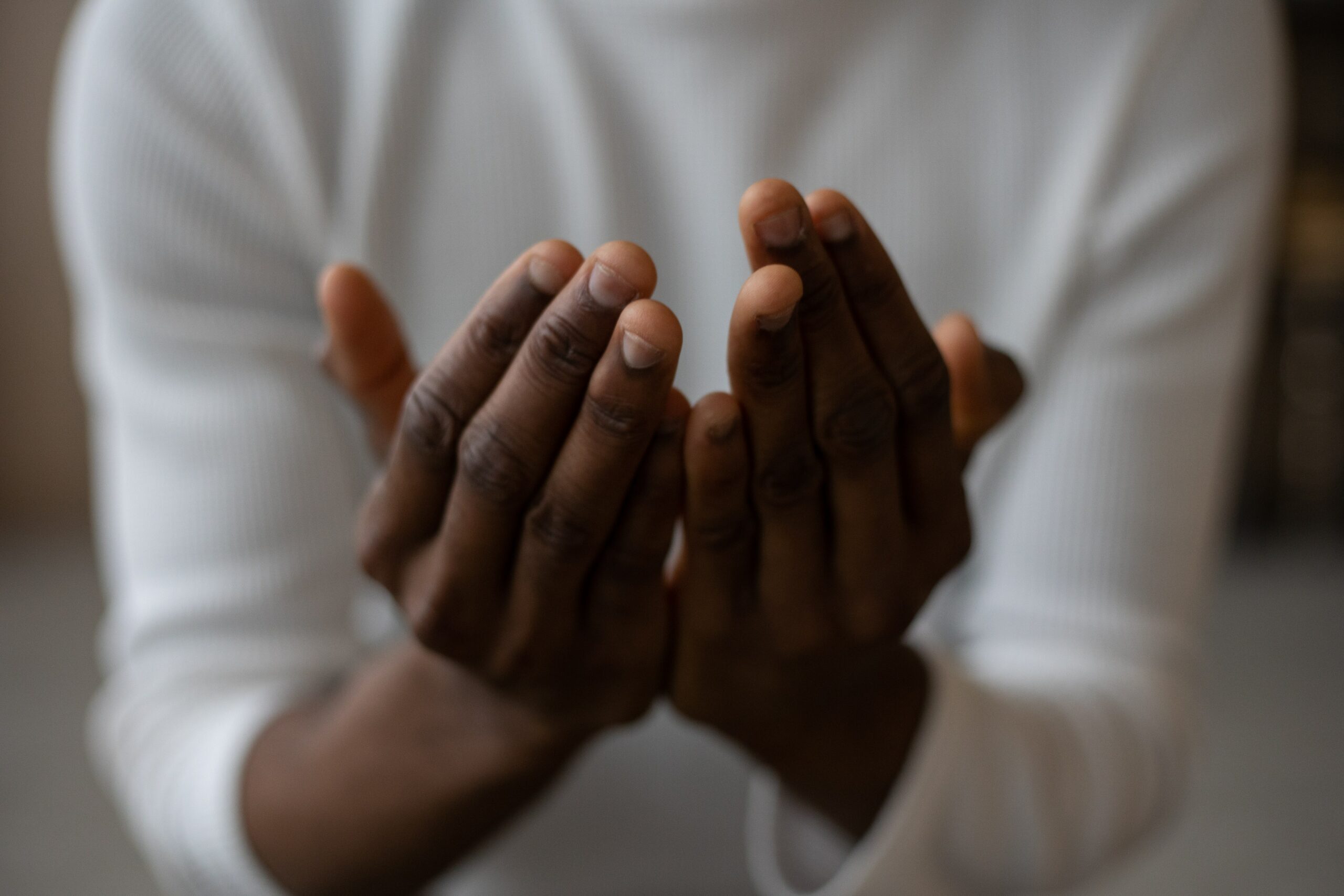 Prayerful hands cupped.Photo by Monstera from Pexels